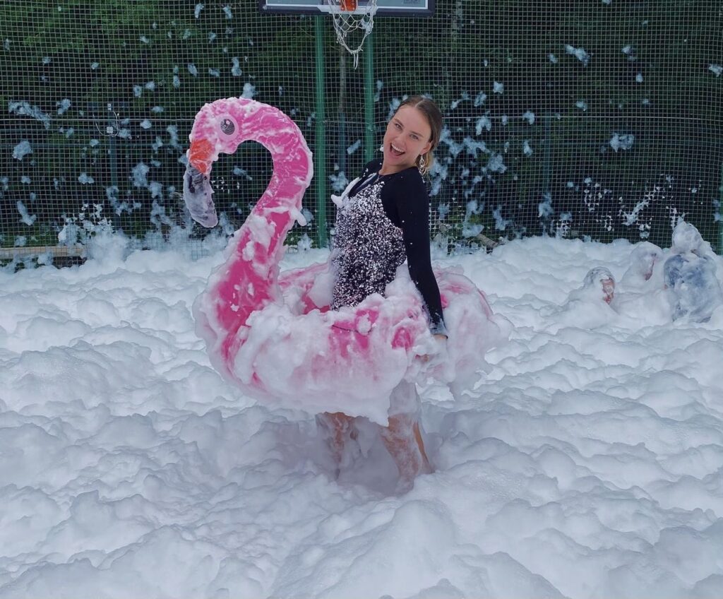 people enjoying a Blizzard Foam outdoor entertainment foam party in Houston Texas