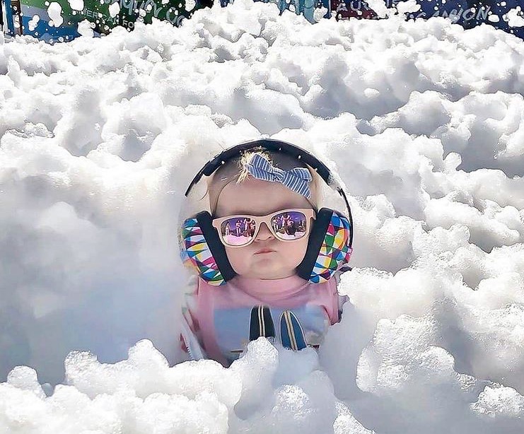people enjoying a Blizzard Foam outdoor entertainment foam party in Houston Texas